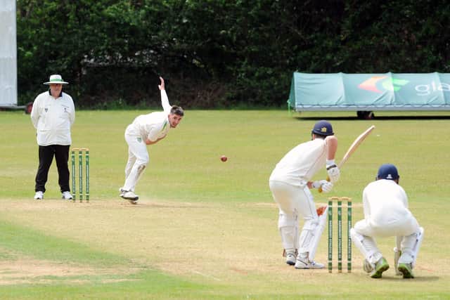 Sarisbury's Jordan Wright in bowling action against Portsmouth.
Picture: Sarah Standing