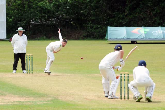 Sarisbury's Jordan Wright in bowling action against Portsmouth.

Picture: Sarah Standing