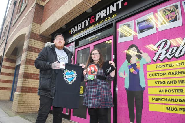 Alex Dutton (31) and his business partner Victoria Lackenby (33) at their new shop Party and Print at the Bridge Shopping Centre in Fratton.
Picture: Sarah Standing (210121-1399)