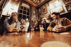 Portsmouth band The Pursuit of Pleasure in the pub for an important band meeting. Picture: Joe Watson