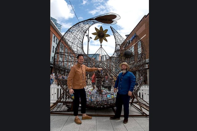 The Treadgold Fish Sculpture in Gunwharf Quays, Portsmouth. Pictured is: Stephen Morgan MP with artist Pete Codling.