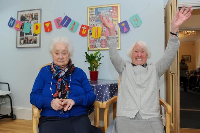Portsmouth's oldest identical twins celebrated their 93rd birthday on Monday, April 18 at Braemar Care Home in Southsea.Pictured is: Identical twins(l-r) Beryl Taylor and Barbara Walford on their 93rd birthday.Picture: Sarah Standing (220422-2148)
