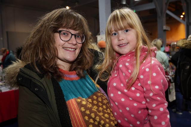Megan Wilding and Juliet, 4, get into the festive spirit at Love Southsea Christmas Market. Picture: Chris  Moorhouse (231124-21)