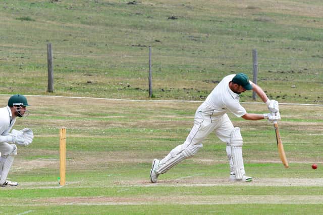 Ricky Rawlins on his way to a century against Bramshaw. Pic: Mike Vimpany