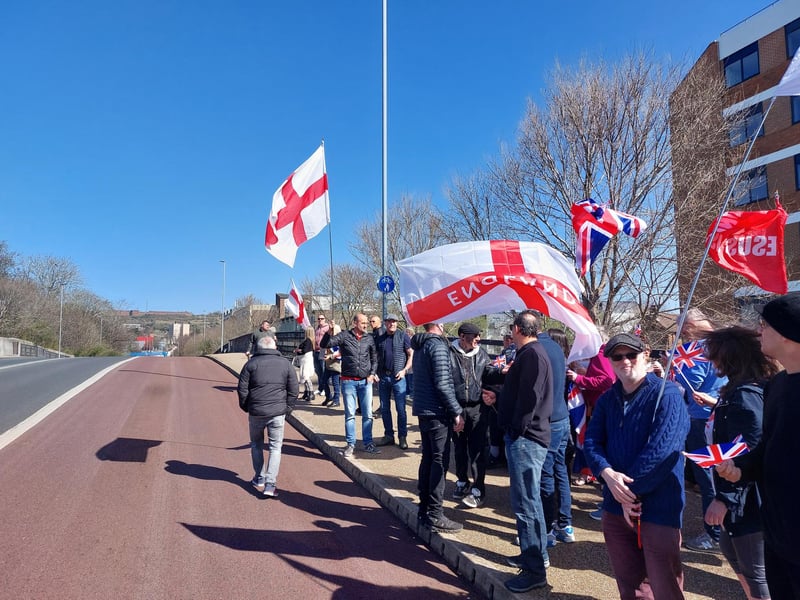 Illegal immigration protestors gathered outside Roebuck House in Cosham on Sunday, March 30.