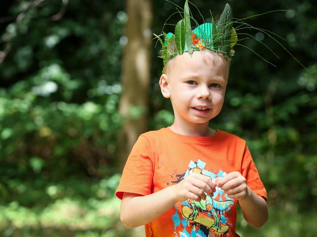 Thomas, 5, wears the leaf crown he made at Holly Hill Woodland Park.Picture: Chris Moorhouse (140824-07)