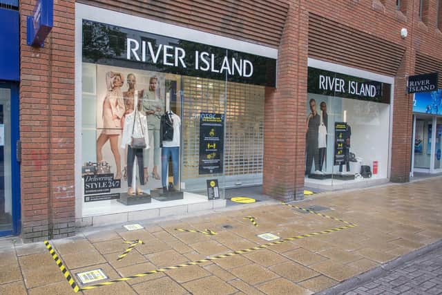 Social distancing measures in place in various shops in Commercial Road, Portsmouth ahead on the opening on 15 June 2020. Picture: Habibur Rahman