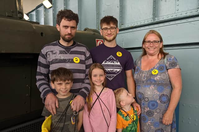 Visitors to the LCT 7074. Top row: Kevin Davies, George Wright, and Liz Davies. Bottom row: Kevin and Liz's other children Robin, nine, Rita, seven, and Daugal, four. Picture: Emily Turner