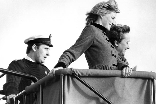 Diana, Princess of Wales taken up on an hydraulic platform for an aerial inspection of the hull of the Mary Rose in November 1982. The News PP184