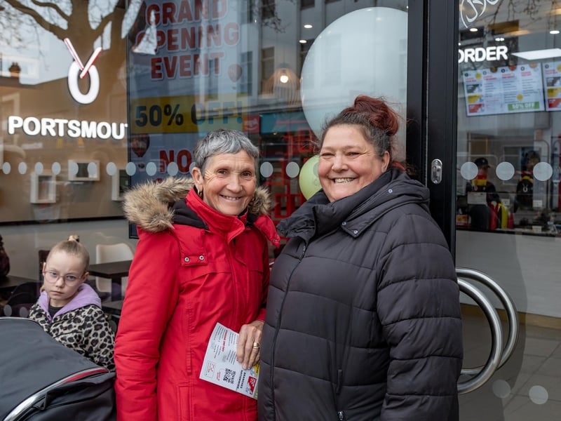 Mrs Futcher (68) and Mrs Glover (48) were at the front of the long queue for the opening of Oodles in Commercial Road. Picture: Mike Cooter