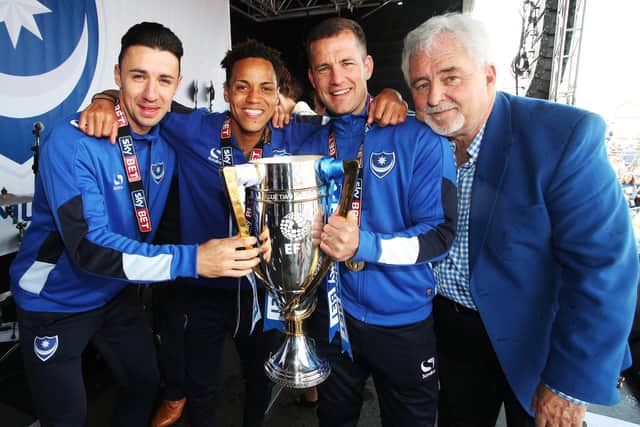 Enda Stevens, Kyle Bennett and Michael Doyle join Iain McInnes during League Two title-winning celebrations in May 2017. Picture: Joe Pepler