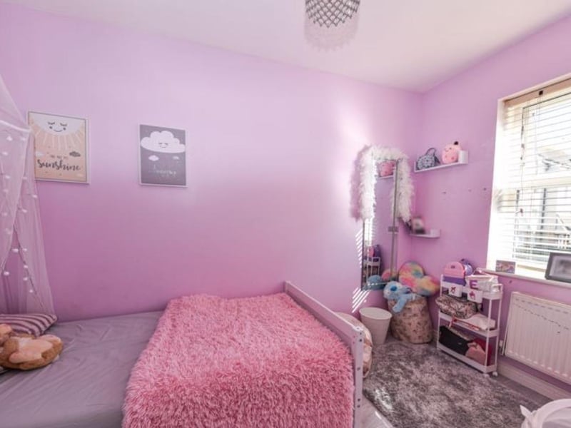 This property comes with four bedrooms, two bathrooms and a reception room.