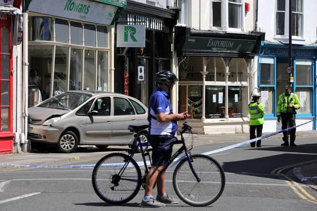 Police at the scene of a road traffic accident in Marmion Road, Southsea. Picture: Chris Moorhouse