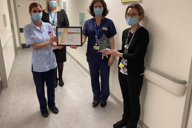 The paediatric diabetes team with Portsmouth Hospitals NHS University Trust's chief people officer Nicole Cornelius