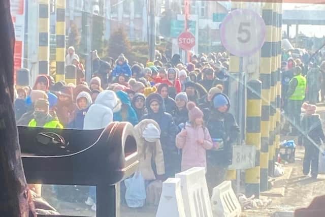 A 10km queue of refugees was pictured by veteran British Army sniper Shane Matthew who arrived in Ukraine today