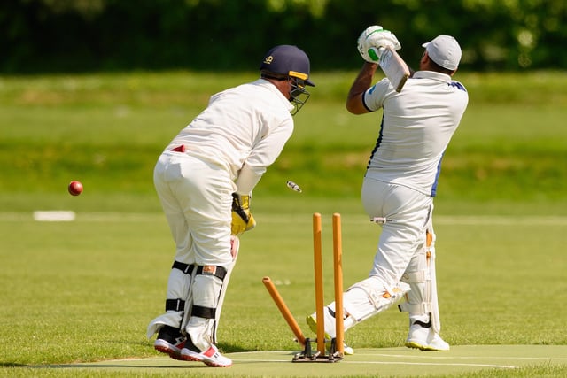 Portsmouth Community batter Kalim Shiraz is bowled for 38 by Simon Gough of Fareham & Crofton 3rds. Picture: Keith Woodland (270521-183)