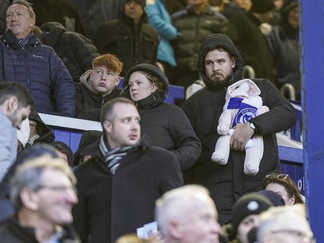 The 20,415 fans packed into Fratton Park had to wrap up warm for the game - including the little one!
