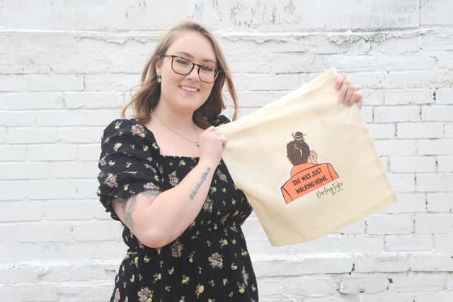 Chelsea Heaton-Penington, 29, from Southsea, has created slogan bags to raise money to help victims of sexual violence through Portsmouth Abuse and Rape Counselling Service, which supported her through rape counselling. Chelsea has designed and printed the bags through her business Darling Inks, and all profits are going to PARCS.
Picture: Sarah Standing (130421-6631)