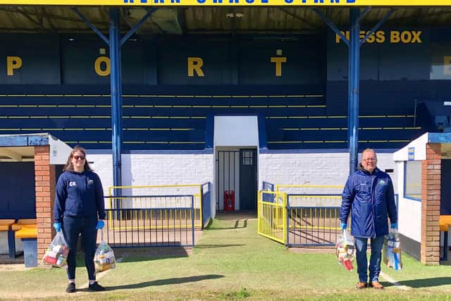 Gosport Borough FC volunteer Clare Kaznowski (left) and Keith Slater with food parcels donated by Aldi. Picture by Debra Redpath