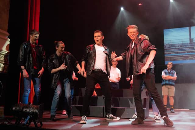 Grease by Stage One Youth Theatre at New Theatre Royal, Portsmouth, February 2022. Danny (Ben Irish) and The T-Birds. Picture by Clearly Wild Photography