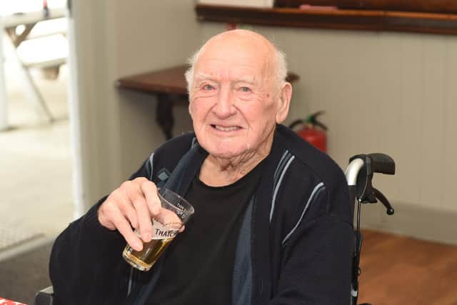 Albert Green known as "Jimmy" from Drayton, turned 100 on Saturday, October 1, and celebrated with his son Peter Green and his friends from the United Reformed Church coffee club, at The Sunshine Inn pub in Drayton.Picture: Sarah Standing (290922-3947)