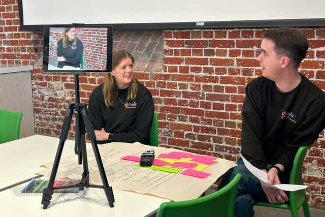 This New Ground Inclusive Arts Committee members Sophie and Stephen interviewing each other.