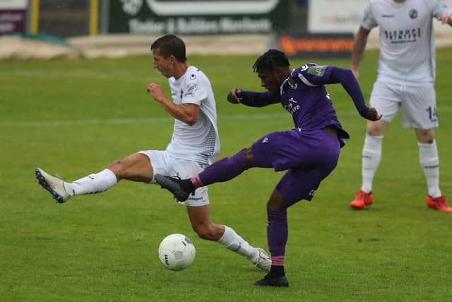 New season, different clubs - Wes Fogden, left, and Darren McQueen during Hawks' play-off semi-final loss to Dartford in July. Fogden is now at Dorking while McQueen has joined higher division Dagenham & Redbridge. Pic: Dave Haines.