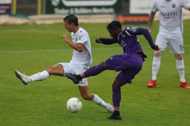 New season, different clubs - Wes Fogden, left, and Darren McQueen during Hawks' play-off semi-final loss to Dartford in July. Fogden is now at Dorking while McQueen has joined higher division Dagenham & Redbridge. Pic: Dave Haines.