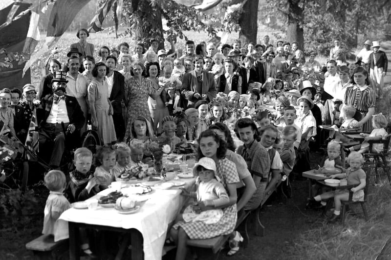 VE Day St Jamess Hospital, Milton
Under shady trees to keep off the hot sun, staff and their children from St Jamess Hospital celebrate the peace with a party.