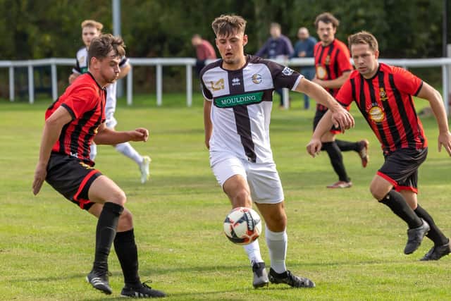 Fleetlands (red/black) have to play nine Wessex League games in 20 days. Picture: Mike Cooter