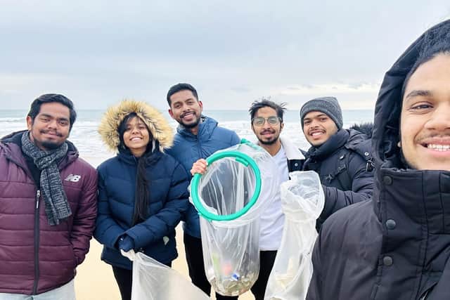 Undated handout photo issued by University of Bristol of Vivek Gurav (middle-right) with a group of volunteers during his plogging tour of the UK. Picture: University of Bristol/PA Wire.