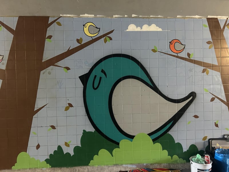 Chris Reeves (Berk) and Mark Jones (Fark) from The Corner Collective in Southsea, have reinvigorated the Washington Road, Emsworth, underpass in a community project funded by Havant Borough Council. Picture by Hollie Busby