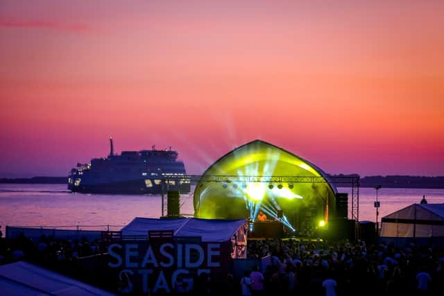 DJ Yoda plays The Seaside Stage as the sun sets in 2019. Picture: James White
