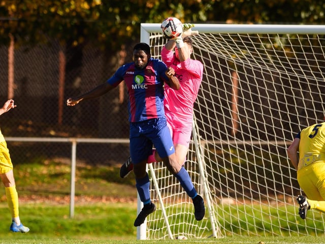 USP's Lamin Jatta and Moneyfields goalkeeper Dylan Kramer. Picture: Keith Woodland