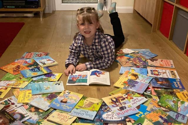 Charlotte Mackney, from Portchester, recently took part in a fundraising reading challenge to purchase presents for children spending Christmas day in Queen Alexandra (QA) Hospital, Cosham.