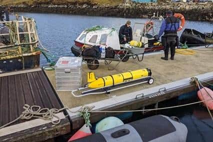 A shot of one of the underwater gliders as it is being prepared to deploy