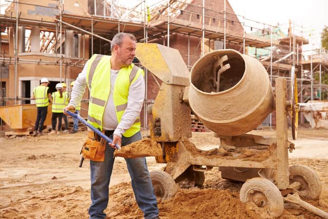 File photos of houses being built on a construction site