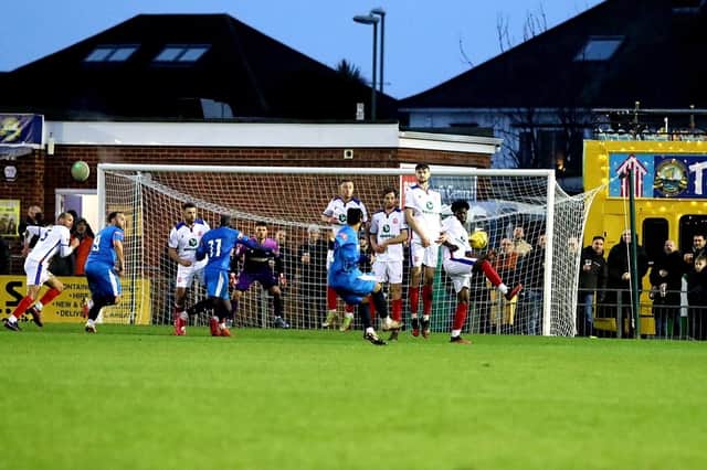 Jordan Edwards curls home the second of his hat-trick goals direct from a free-kick at Privett Park. Picture: Tom Phillips