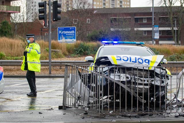 A police car has been left mangled by a crash with a BMW outside Portsmouth Naval Base blocking M275. Picture: Habibur Rahman