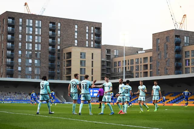 Rochdale's Jake Beesley celebrates scoring against AFC Wimbledon at Plough Lane on Tuesday night. Now Pompey are heading to the new ground. Picture: Alex Davidson/Getty Images