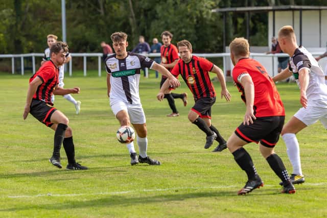Fleetlands (red/black) could have to play seven Wessex League games in 10 days. Picture: Mike Cooter