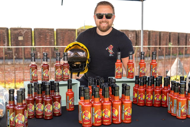 Former firefighter Matt Broxton from Kentish Town with his range of 'Saucy Firefighter' dressings. Picture: Mike Cooter (210522)