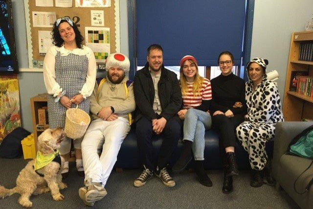 Staff (and dog!) at Holgate Meadows School showing off their costumes.