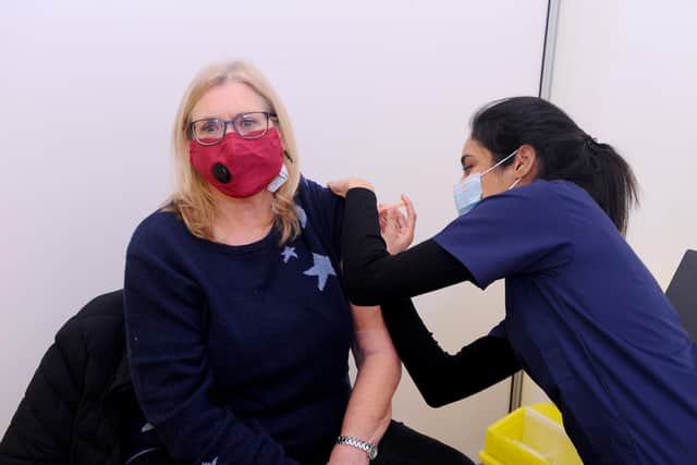 Maureen Percival, 73, from Horndean gets her vaccination. Picture: Sarah Standing (040221-2227)