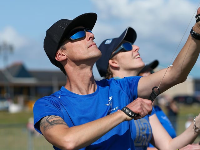 Stephan Friers and Joanna Chaperon fly their kites at the festival.Picture: Chris  Moorhouse (270724-03)