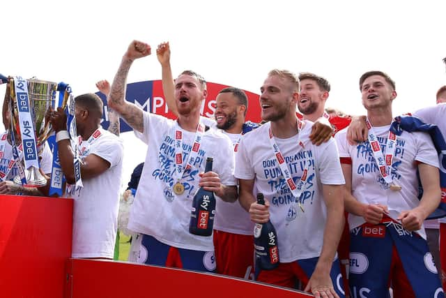 Former Pompey duo Tom Naylor and Jack Whatmough won League One promotion with Wigan last term.   Picture: Charlotte Tattersall/Getty Images