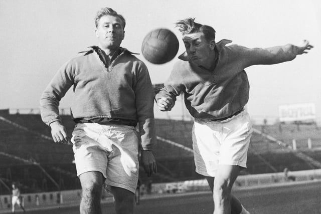 Cousins Jack, left, and Redfern Froggatt, who play for Portsmouth and Sheffield Wednesday FC, heading the ball during training at the Chelsea ground before they play for England against Wales at Wembley, 11th November 1952. (Photo by Reg Birkett/Keystone/Getty Images)