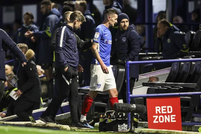 Pompey await news on Shaun Williams following his concerning injury on Monday night against Charlton. Picture: Robin Jones