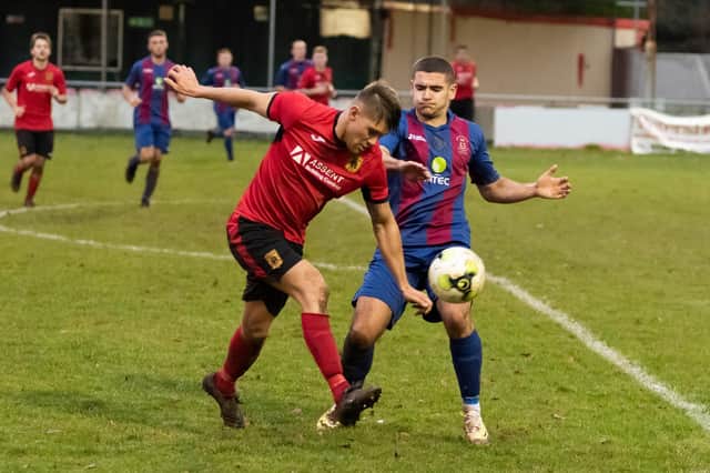 Harry Bedford, right, was on target for US Portsmouth reserves in their 9-0 thrashing of Liphook. Picture: Duncan Shepherd