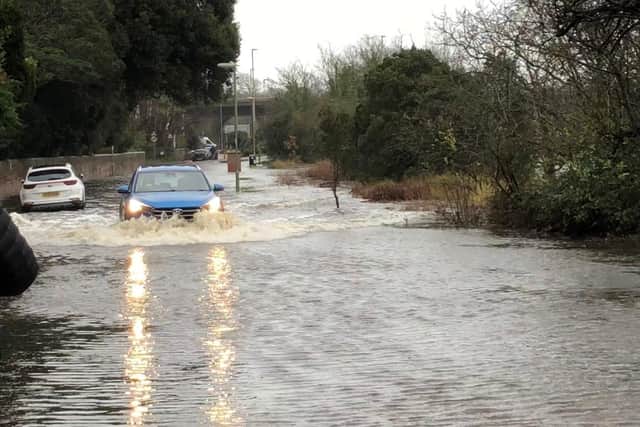 Flooding in Wallington has seen intrepid drivers brave the waters to complete their journeys around the area.